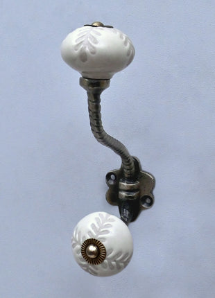 Textured Carved Off-White Ceramic Knob With Metal Wall Hanger