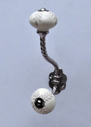 Textured Carved Off-White Ceramic Knob With Metal Wall Hanger