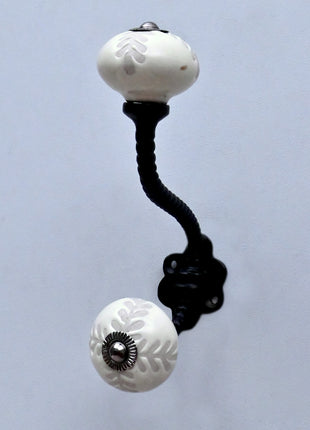 Textured Carved Off-White Ceramic Knob With Metal Wall Hanger