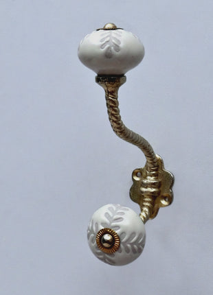 Textured Carved Off-White Ceramic Knob With Metal Wall Hanger