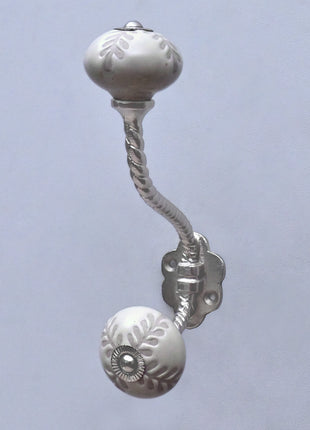 Textured Carved Off-White Ceramic Knob With Metal Wall Hanger