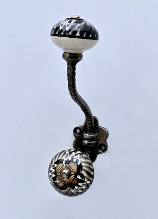 Black and Off-White Swirl Ceramic Knob With Metal Wall Hanger