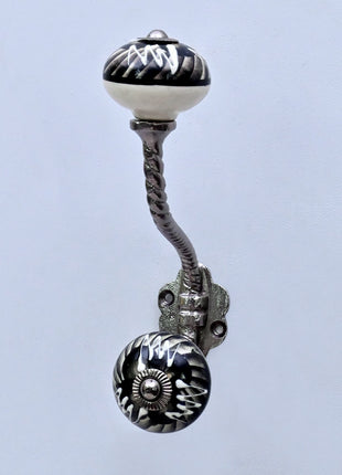 Black and Off-White Swirl Ceramic Knob With Metal Wall Hanger