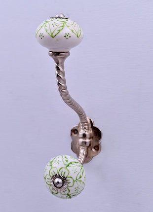 Green Floral on White Ceramic Knob With Metal Wall Hanger