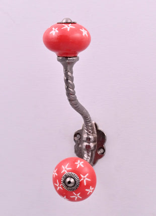 White Starburst on Red Ceramic Knob With Metal Wall Hanger