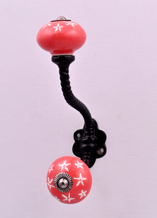 White Starburst on Red Ceramic Knob With Metal Wall Hanger