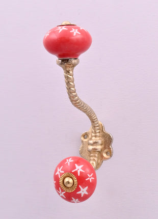 White Starburst on Red Ceramic Knob With Metal Wall Hanger