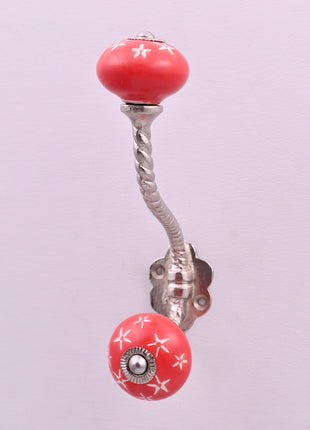 White Starburst on Red Ceramic Knob With Metal Wall Hanger