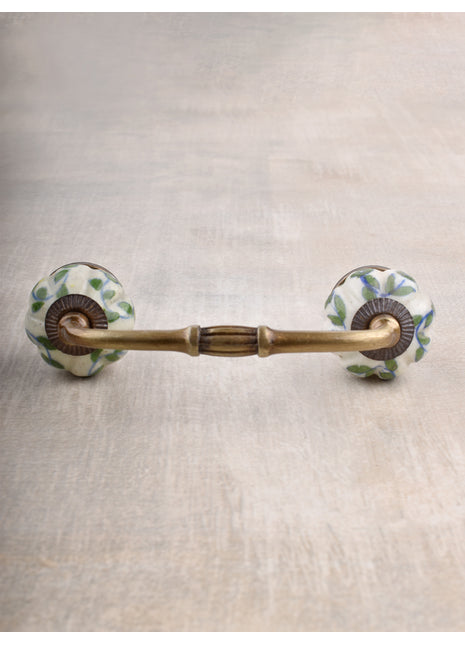 White Ceramic Melon Shaped Dresser Cabinet Pull With Green Design