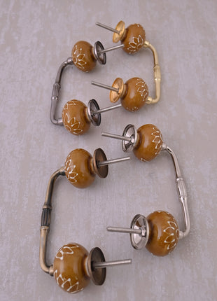 Stylish Brown Kitchen Cabinet Pull With Light Brown Embossed Design