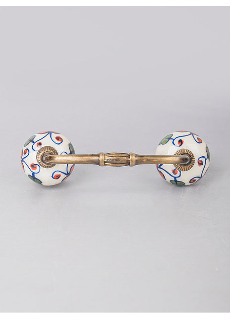Red and Green Design on White Ceramic Cabinet Pull