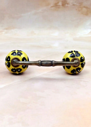 Black Flowers Design on Yellow Base Ceramic Knob Door Pull