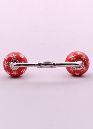 White Starburst on Red Ceramic Knob Door Pull