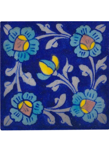 blue tile with turquoise yellow and purple design 3x3