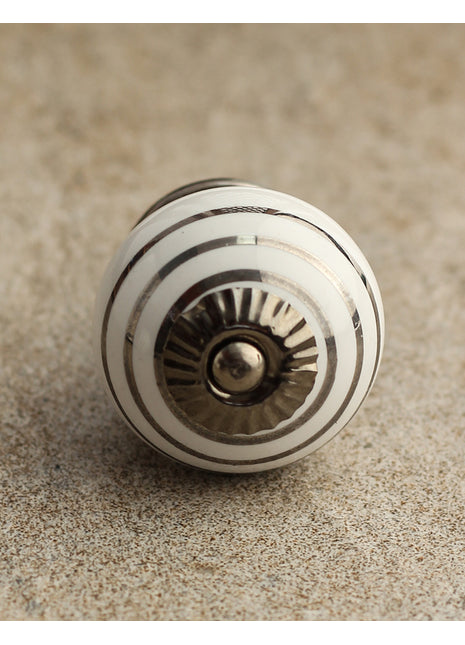 Silver Stripes on a White Ceramic Cabinet Knob