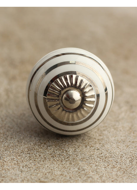 Silver Stripes on a White Ceramic Cabinet Knob