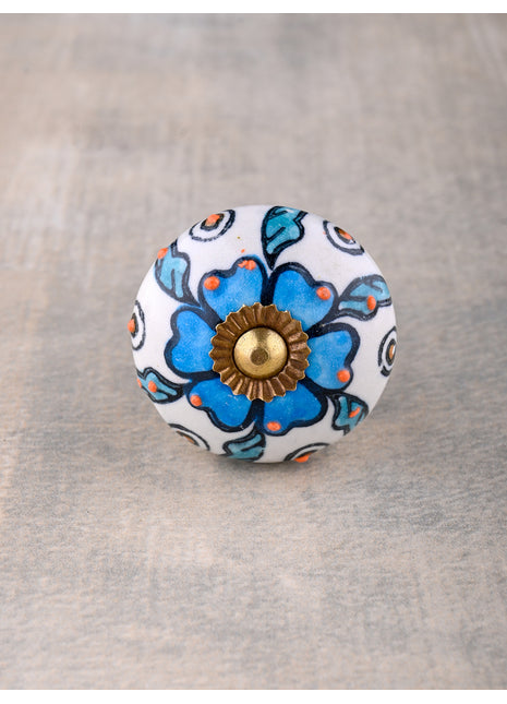 Turquoise Flower On White Dresser Cabinet Knob With Orange Embossed Design