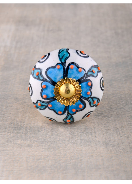 Turquoise Flower On White Dresser Cabinet Knob With Orange Embossed Design