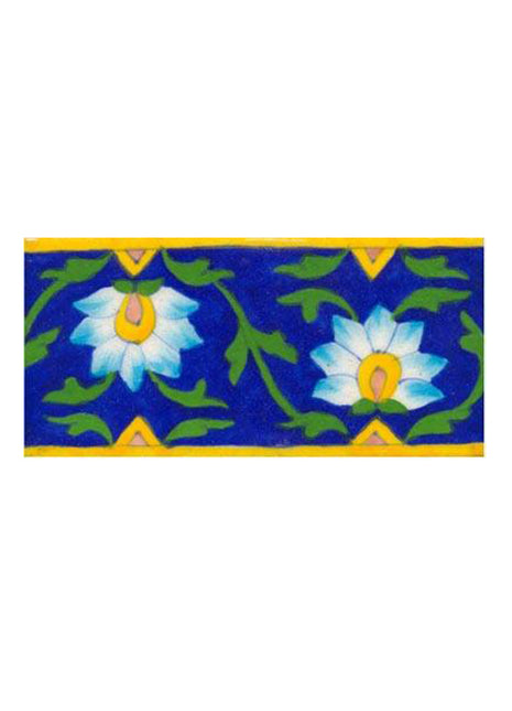 sky blue &white flower with green leaves on blue tile