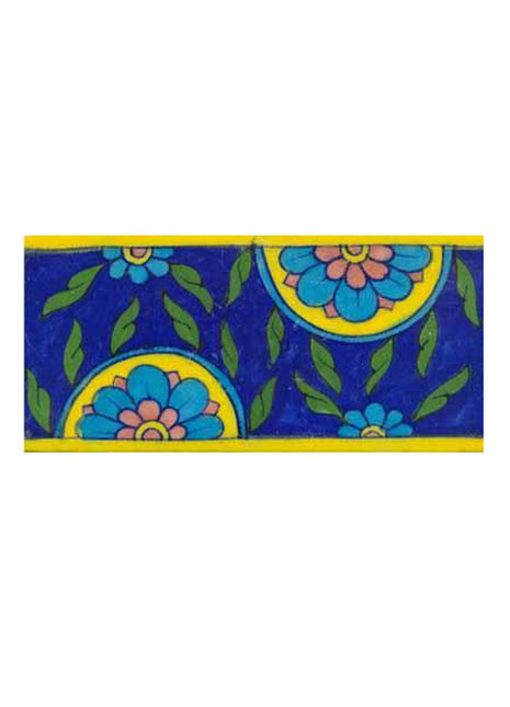 blue tile with turquoise and pink flowers and green leaves