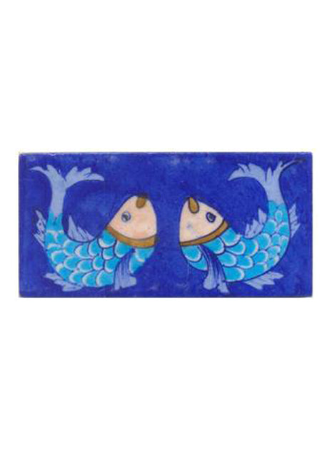 Two turqouise fish and blue tile