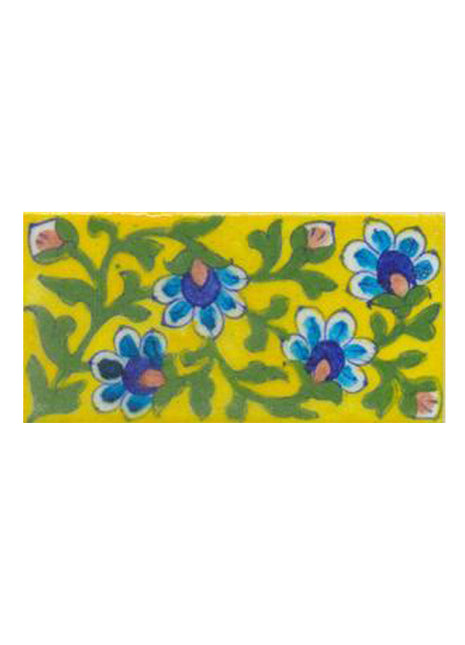 Four turqouise flower and green leaves with yellow tile