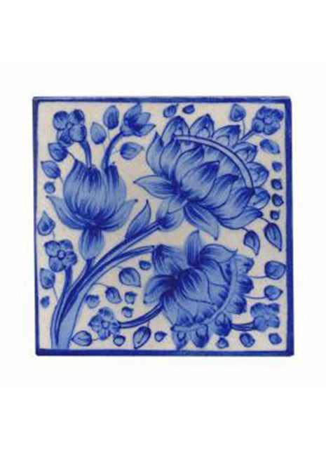 Blue flower and leaves with white tile