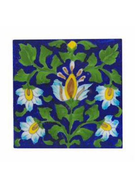 Turqouise,yellow,brown flower and green leaves with blue tile