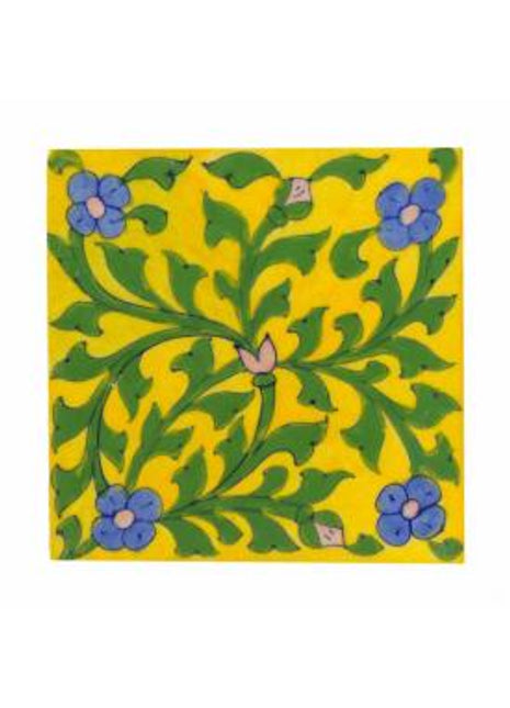 Lime blue flower and green leaves with yellow tile