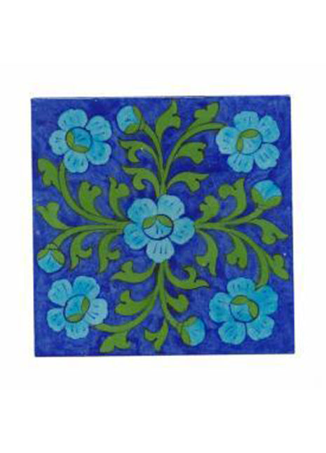 Turqouise flower's and green leaves with blue tile