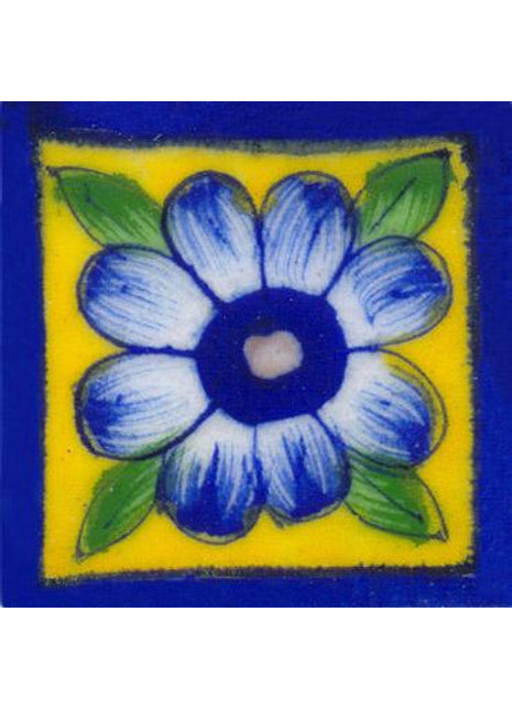 Blue bordered yellow tile wih blue flower