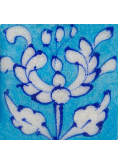 white floral on turquoise tile