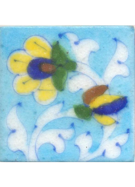 Yellow and Blue Flowers With White Leaves On Turquoise Base Tile