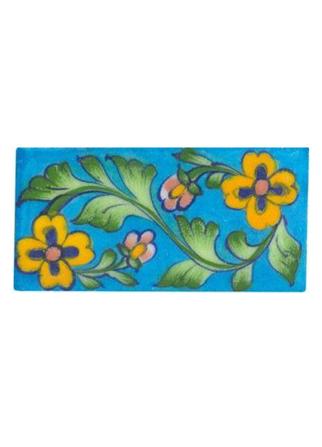 yellow flowers and green leaves with pink flowers on turquoise tile