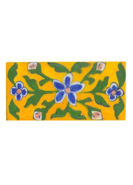 yellow tile painted with blue, pink green design 2x4