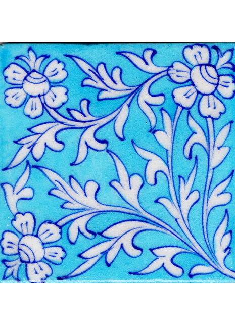 White Flowers and White Leaves Design On Turquoise Tile