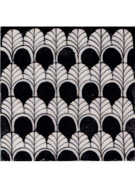 White Pattern On Black Base Tile