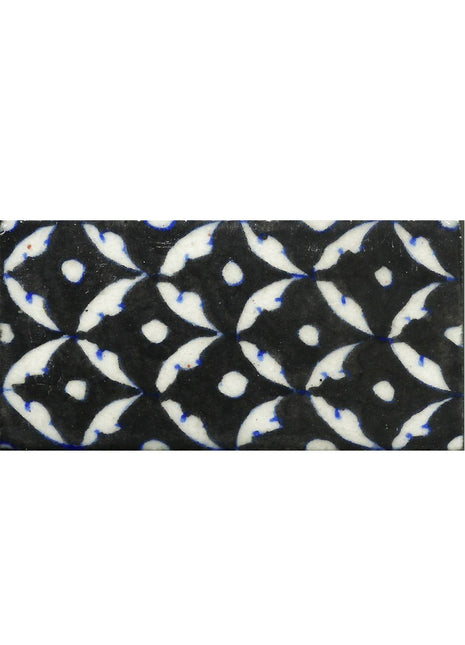 White Pattern On Black Base Tile