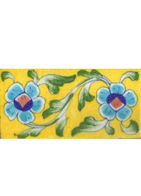 Two Turquoise Flowers On Yellow Base Tile