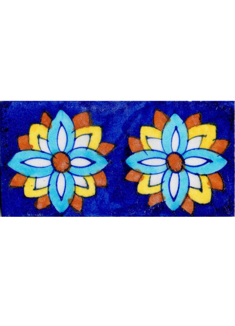 Two Flower Design On Blue Tile