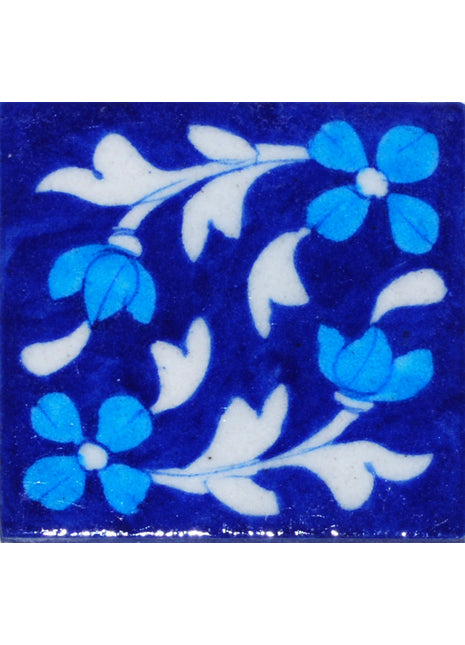 Turquoise flower with White leaves on Blue base. (3x3)