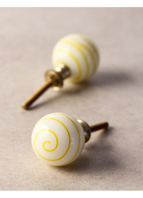 White Round Glass Kitchen Cabinet Knob With Yellow Spiral