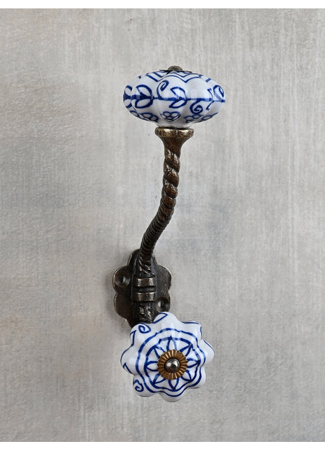 White Ceramic Knob With Floral Design Metal Wall Hanger