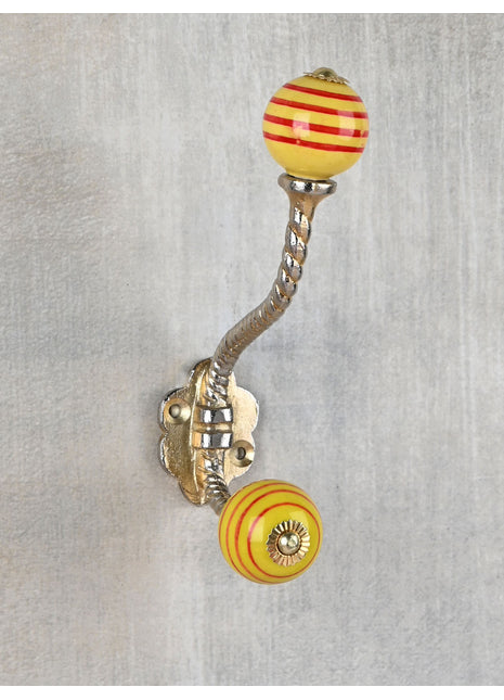 Yellowish Brown and Red Circular Striped Ceramic Knob With Metal Wall Hanger