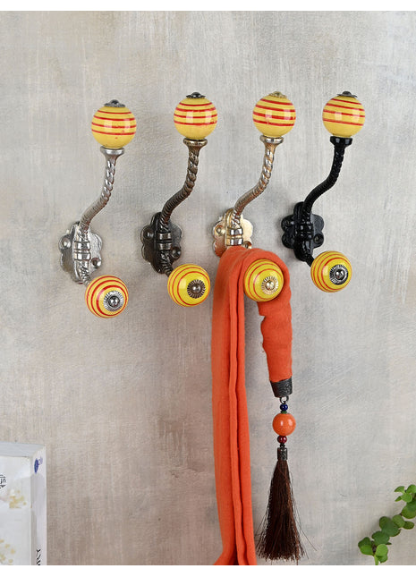 Yellowish Brown and Red Circular Striped Ceramic Knob With Metal Wall Hanger