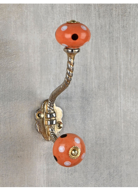 Round Orange Cabinet Knob With White And Brown Polka Dots Metal Wall Hanger