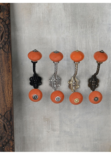 Solid Orange Colored Knob With Metal Wall Hanger