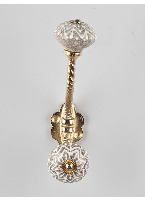 Embossed White Design on Light Gray Base Knob With Metal Wall Hanger