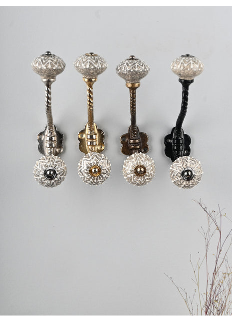 Embossed White Design on Light Gray Base Knob With Metal Wall Hanger