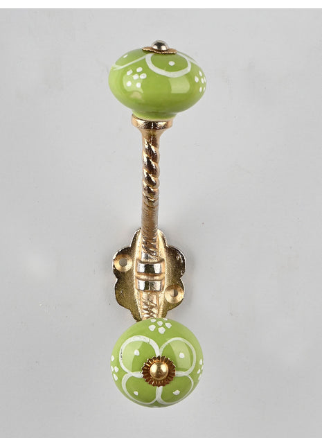 White Flower Design on Green Base Knob With Metal Wall Hanger
